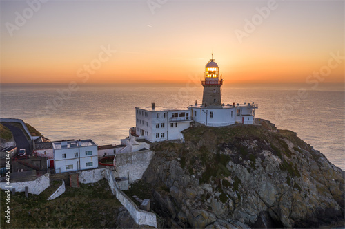 Aerial view of Howth Lighthouse at sunrise, beautiful Irish coastline Lighthouse. © Ire DronePhotography