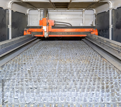 inside of empty cnc laser cutting machine - without workpiece metal sheet photo