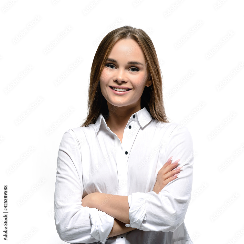 Portrait of an attractive young woman with white teeth smile. Female doctor in white coat isolated on white background Portrait of an attractive young woman with white teeth smile. Female doctor in white coat isolated on white background