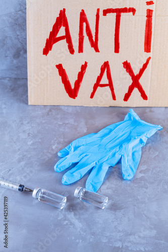 'Anti vax' protestive placard. Stop vaccination concept. Coronavirus Anti Vax controversy concept