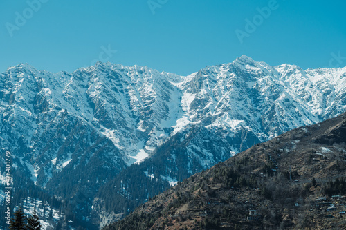View of The Seven Sisters Peak mountains covered by snow as seen from the Solang valley in Manali, Himachal Pradesh, India © Shiv Mer