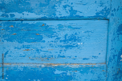 blue wooden grunge background with cracked paint