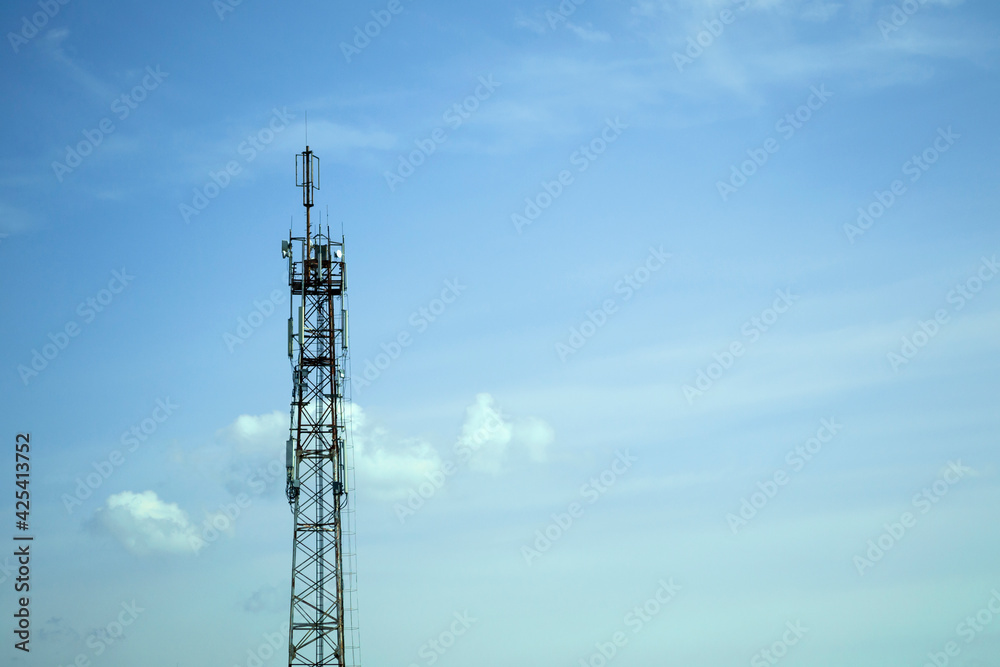 Internet tower against the blue sky. Telecommunication tower with TV transmitter. Communication tower.