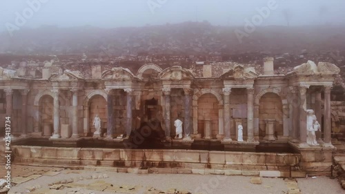 View of ruins of Roman building of Antonine Nymphaeum in ancient city of Sagalassos in Burdur Province, Turkey. High quality 4k footage photo