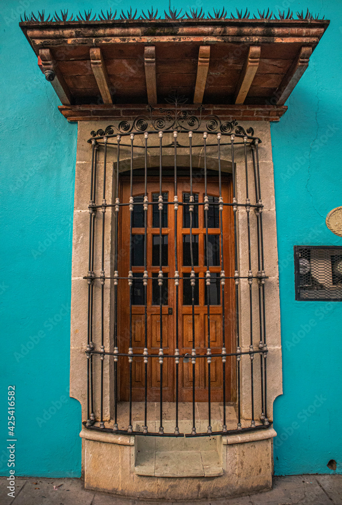 Puerta de madera con reja-Centro historico de Oaxaca Stock Photo | Adobe  Stock