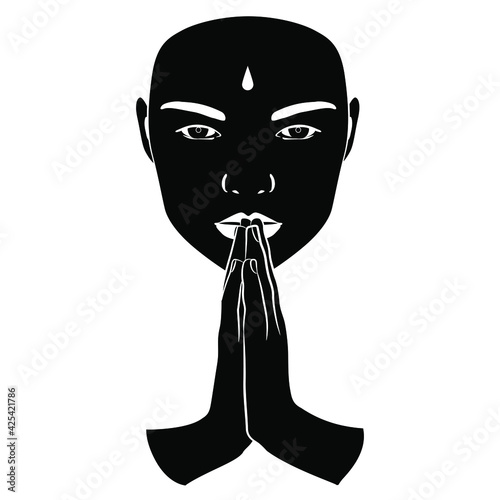 Human face with hands folded in praying namaste gesture. Black and white silhouette. Creative holy religious concept.