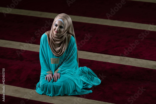 Young Muslim Woman Praying photo