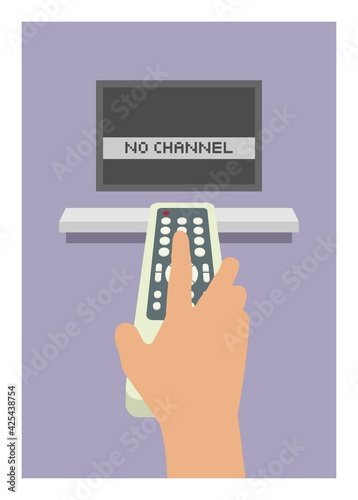 Hand pushing remote control button, aiming to the television screen.