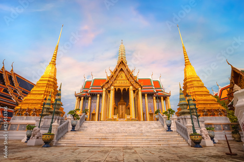 Wat Phra Kaew in Bangkok thailand is a sacred temple and it's a part of the Thai grand palace, the Temple that houses an ancient Emerald Buddha photo