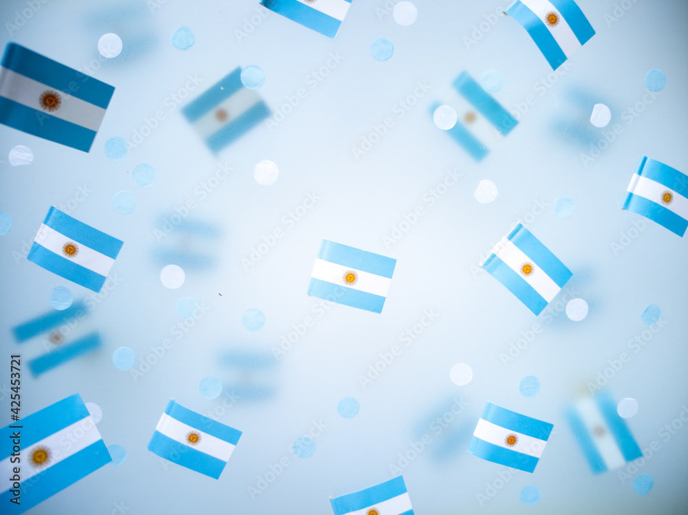 Argentina Independence Day. July 9. National flags on a foggy background. The concept of memory, patriotism and freedom