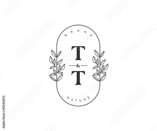 initial TT letters Beautiful floral feminine editable premade monoline logo suitable for spa salon skin hair beauty boutique and cosmetic company.