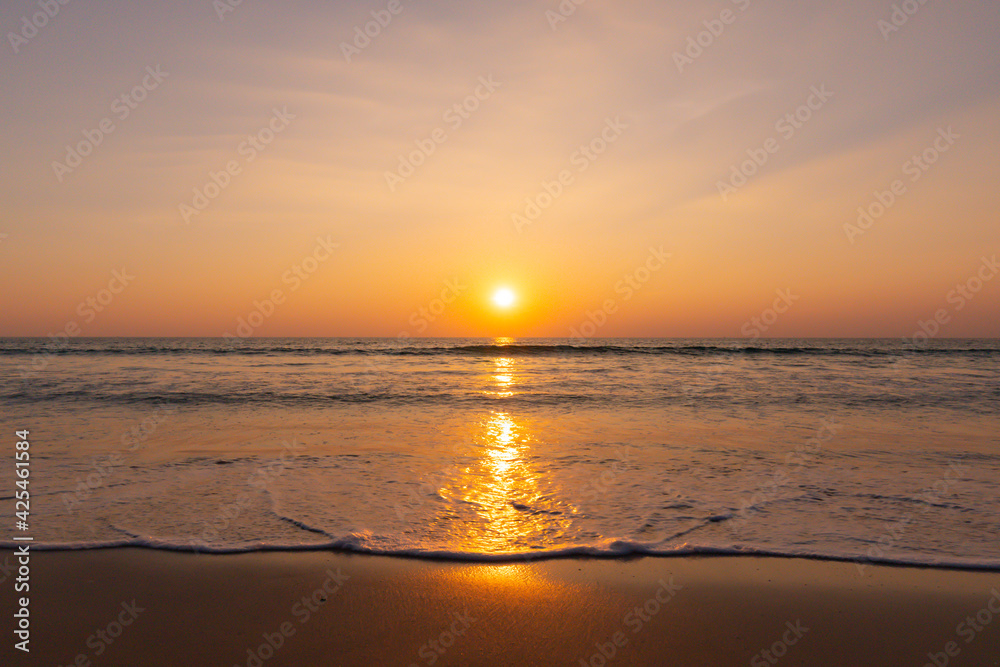 Sunset beach sand and sew water clear. Nature image view of beautiful tropical beach and sea in sunny day. Sunset at beach. At Phuket, Thailand. Sunset beach sand and sew water clear. Nature image view of beautiful tropical beach and sea in sunny day. Sunset at beach. At Phuket, Thailand.