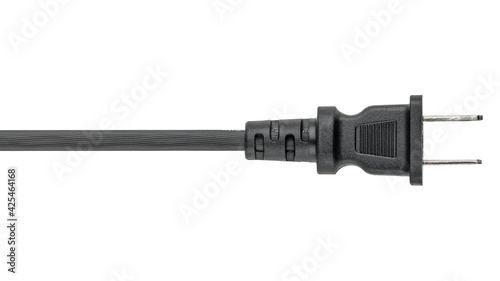 Electrical Wire with Power plug. Black rubber Cord or cable with plug. United States and Canada, national standards voltage 110V - 120V. Macro close-up photo on white isolated background.