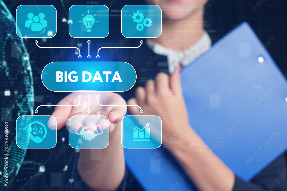 Business, Technology, Internet and network concept. Young businessman working on a virtual screen of the future and sees the inscription: Big data Business, Technology, Internet and network concept. Young businessman working on a virtual screen of the future and sees the inscription: Big data