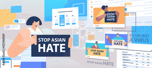 mix race people holding text banners against bullying and racism stop asian hate support during covid-19 pandemic