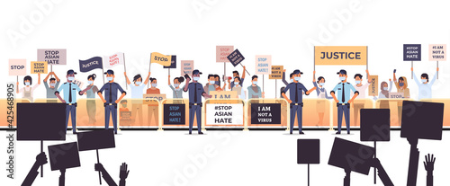 stop asian hate people holding banners against racism support during covid-19 coronavirus pandemic concept