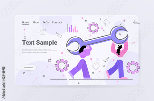developers team carrying wrench programmers creating website ui web development program software optimization