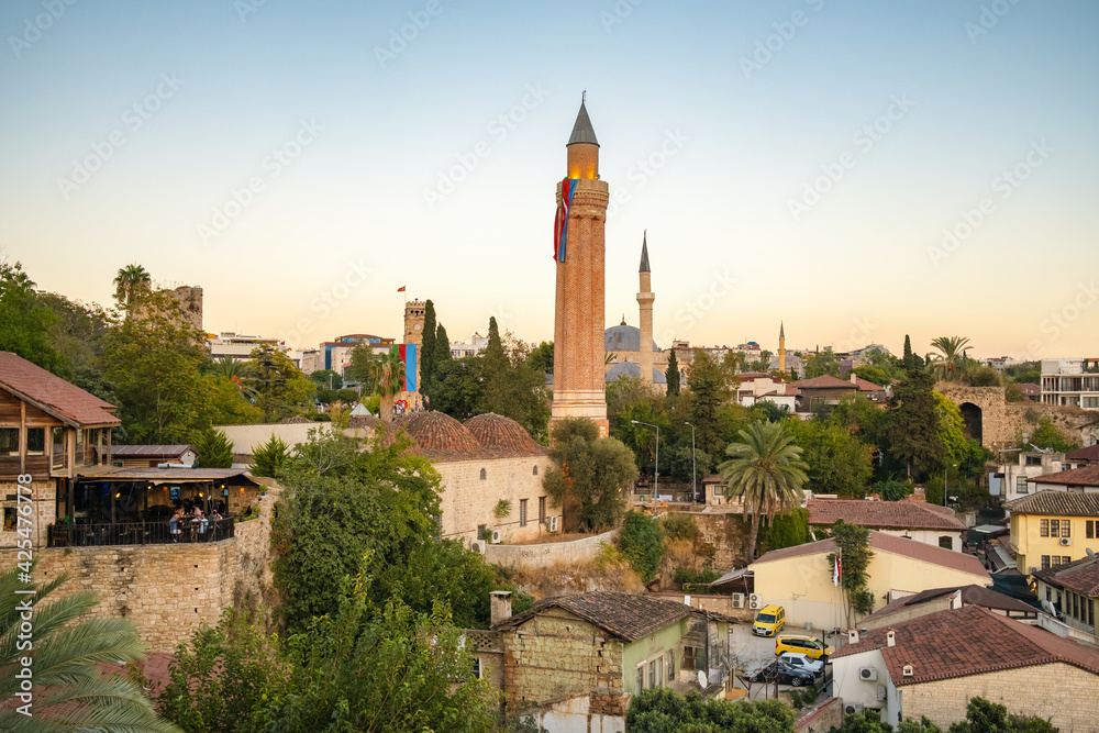 Clock tower and Yivli minaret in Kaleici old town of Antalya, Turkey