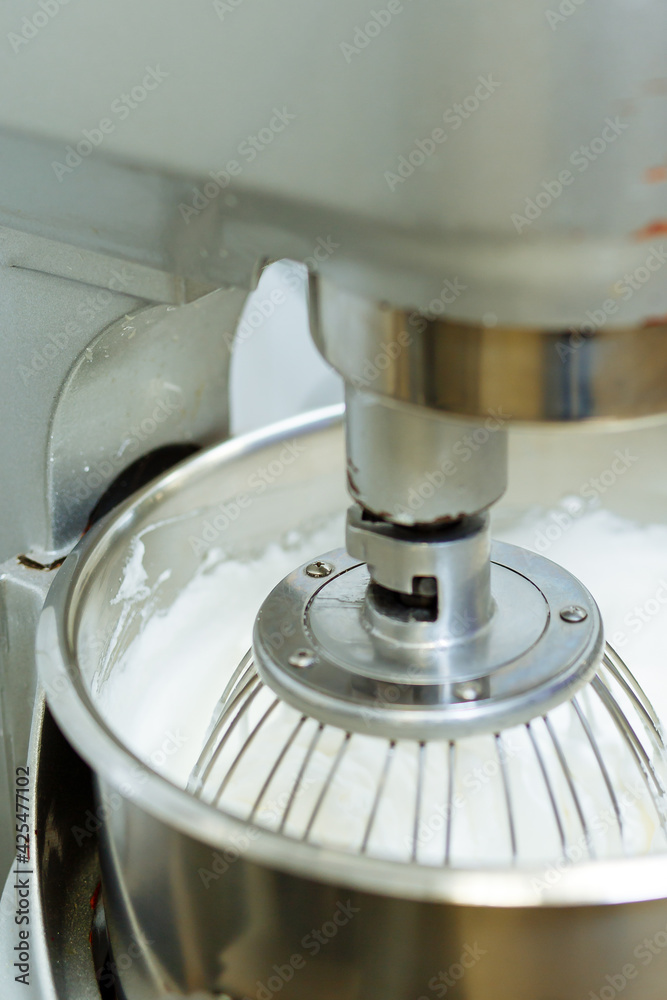 industrial mixer attachments for mixing dough and fillings of cakes and pastries. Confectionery factory industrial mixer attachments for mixing dough and fillings of cakes and pastries. Confectionery factory