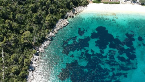 Aerial view over the rocky beach Leftos Gialos in Alonissos island, Sporades, Greece photo