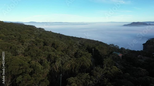 Drone footage of Fog in the Megalong Valley in The Blue Mountains in New South Wales in Australia photo