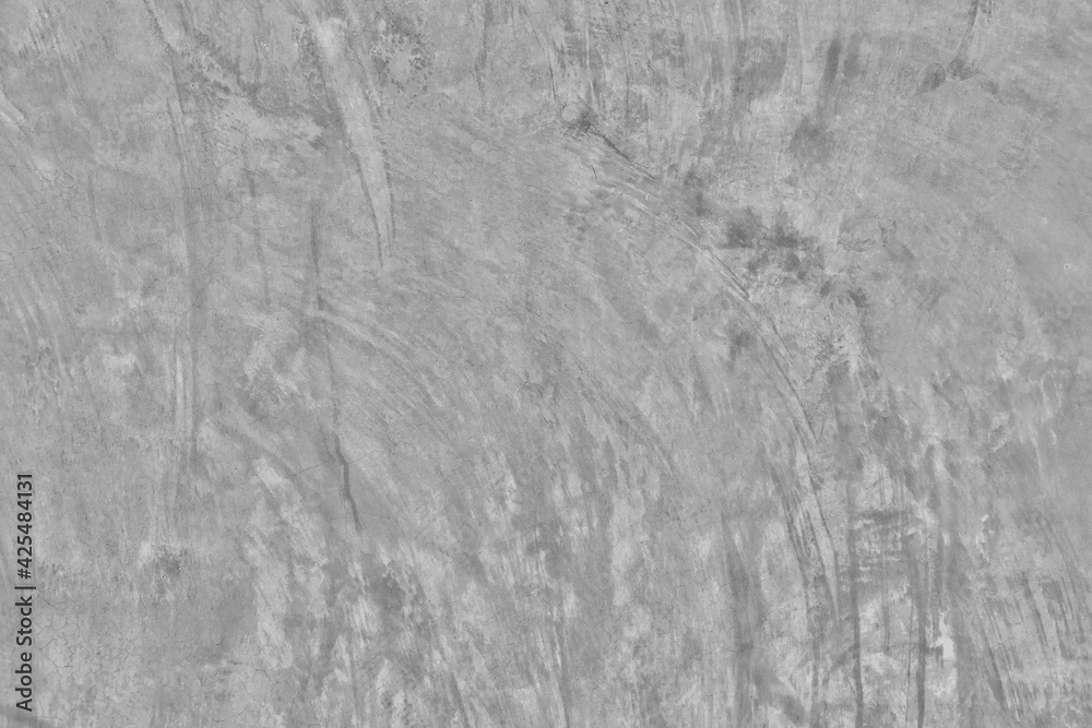 Naklejka premium Texture of a old grungy gray concrete wall with cracks as a background or wallpaper