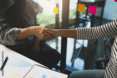 Teamwork colleagues business people handshake after meeting..