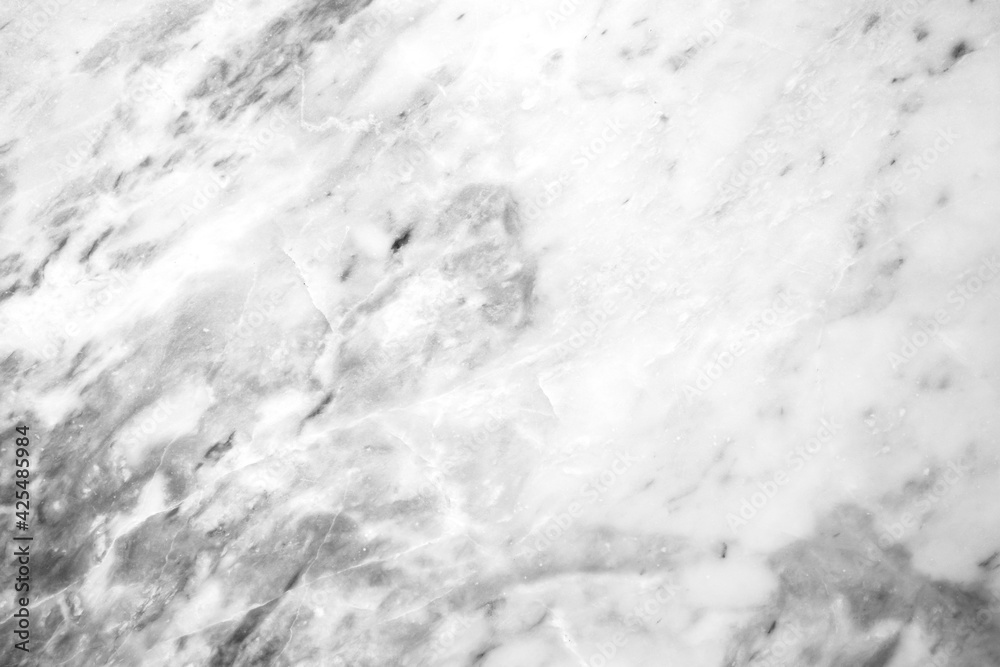Marble texture abstract background coming from natural stone. White marble panel has a beautiful dark pattern that is empty.