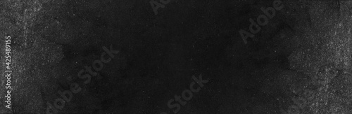 Blank wide screen Real chalkboard background texture in college concept for back to school classroom for black friday white chalk text draw graphic. Grey gradient slate table blackboard bacground.