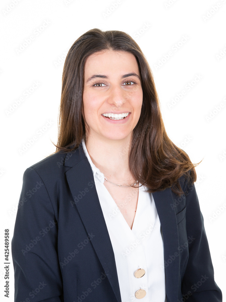Happy smiling business woman brown hair in suit posing isolated in white wall background Happy smiling business woman brown hair in suit posing isolated in white wall background