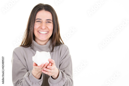 happy woman with pig small piggy money bank on white background in financial planning concept
