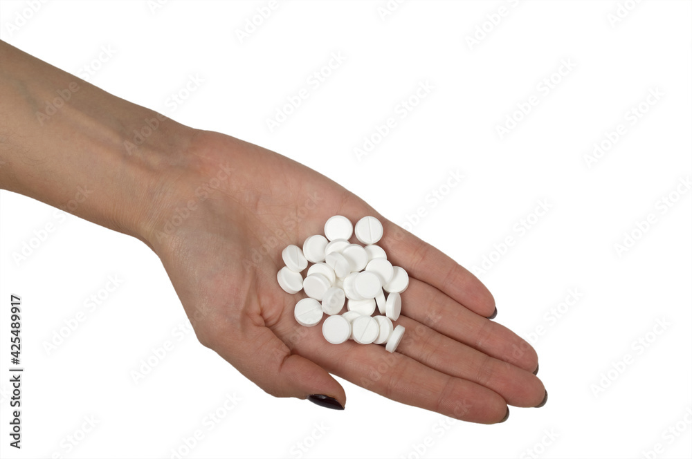 Pills in a hand isolated on white background. Medicine Pills in a hand isolated on white background. Medicine