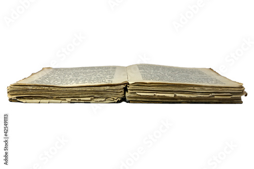 Old opened damaged book isolated on white background photo