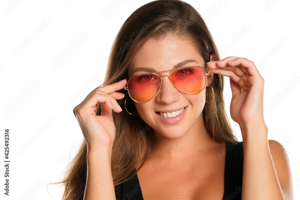 a young beautifu woman with blue eyes and sunglasses