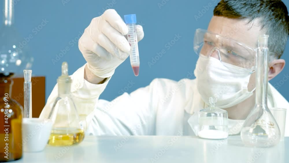 Laboratory: Scientist Works with Blood Samples. Concept of Pharmaceutical Research for Antibiotics. Laboratory: Scientist Works with Blood Samples. Concept of Pharmaceutical Research for Antibiotics.