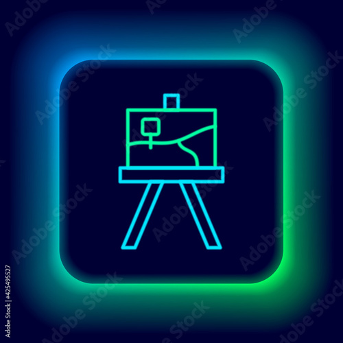 Glowing neon line Wood easel or painting art boards icon isolated on black background. Colorful outline concept. Vector