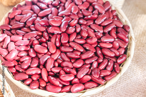 Red kidney bean in basket , fresh organic food background