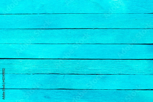 Blue color wood plank use as textured background, frame, decoration with copy space