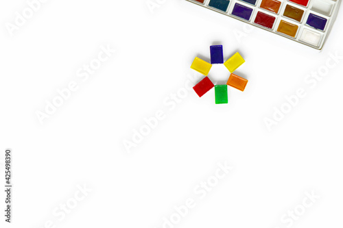 Free Download Watercolor paints in a set and lined with a flower. Drawing set. sun-shaped paints. - GFXLoad