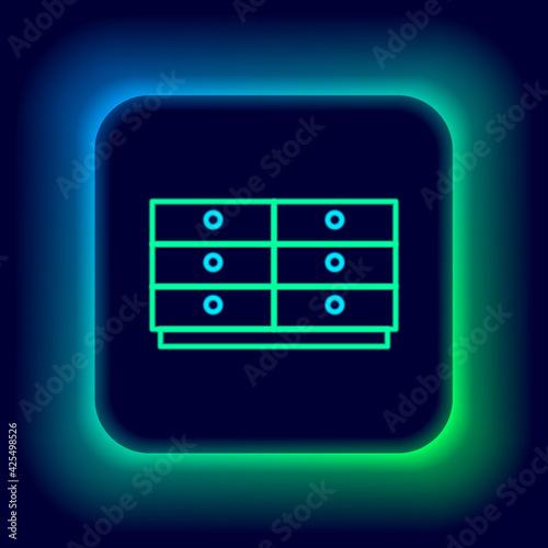 Glowing neon line Chest of drawers icon isolated on black background. Colorful outline concept. Vector
