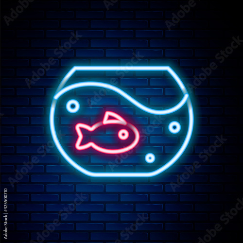 Glowing neon line Aquarium with fish icon isolated on brick wall background. Round glass aquarium. Aquarium for home and pets. Colorful outline concept. Vector
