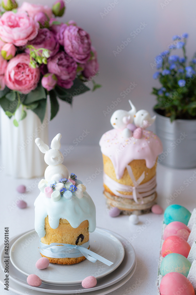 Easter cake kulich. Traditional Easter sweet bread decorated meringue.