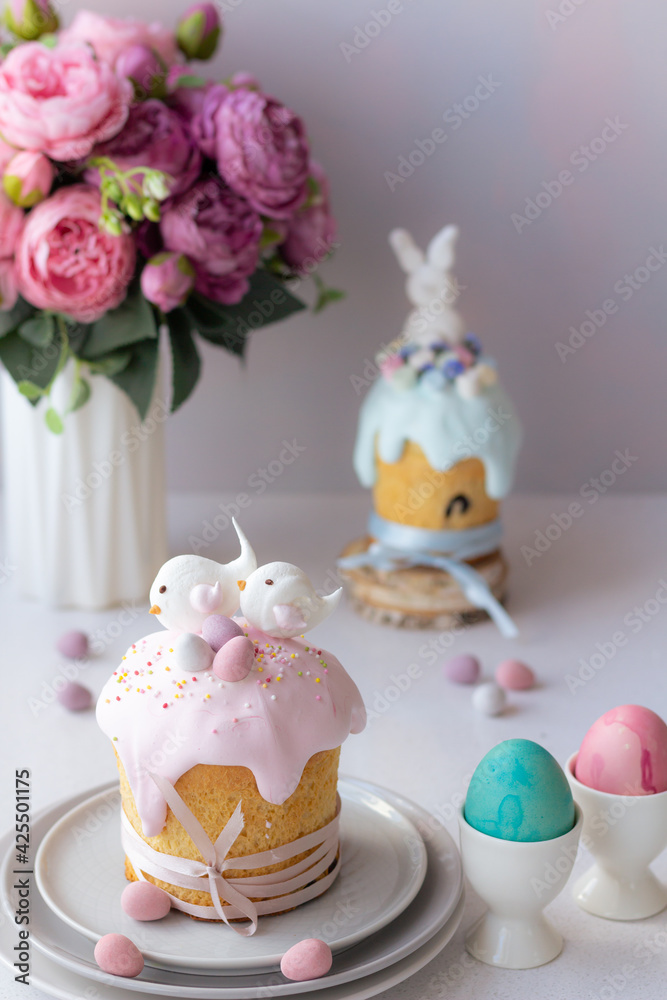 Easter cake kulich. Traditional Easter sweet bread decorated meringue.