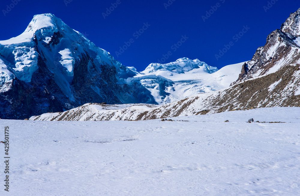 Snowy mountain landscape.Mountain landscape. Scenic Gurudogmar Lake is one of the highest lakes in the world in Sikkim, India, located at an altitude of 5,430 m.