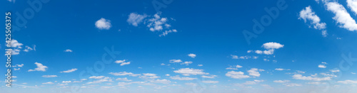 Panoramic fluffy cloud in the blue sky. Sky with cloud on a sunny day.
