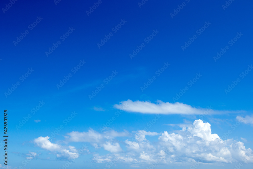 blue sky background with tiny clouds blue sky background with tiny clouds