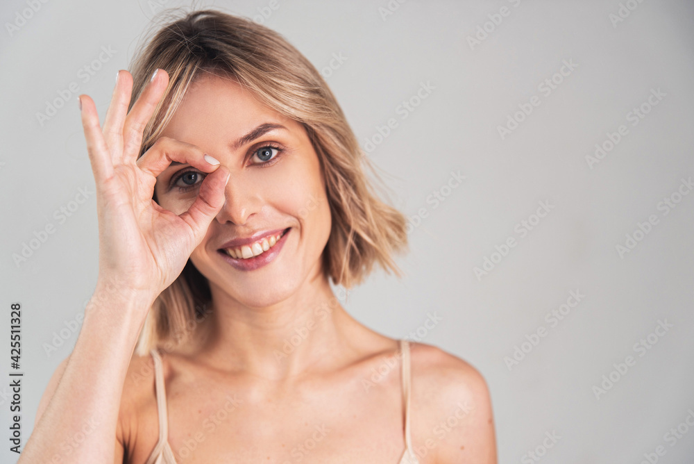 Portrait of a girl of European appearance on a light background Portrait of a girl of European appearance on a light background