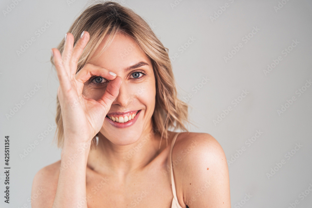 Portrait of a girl of European appearance on a light background Portrait of a girl of European appearance on a light background