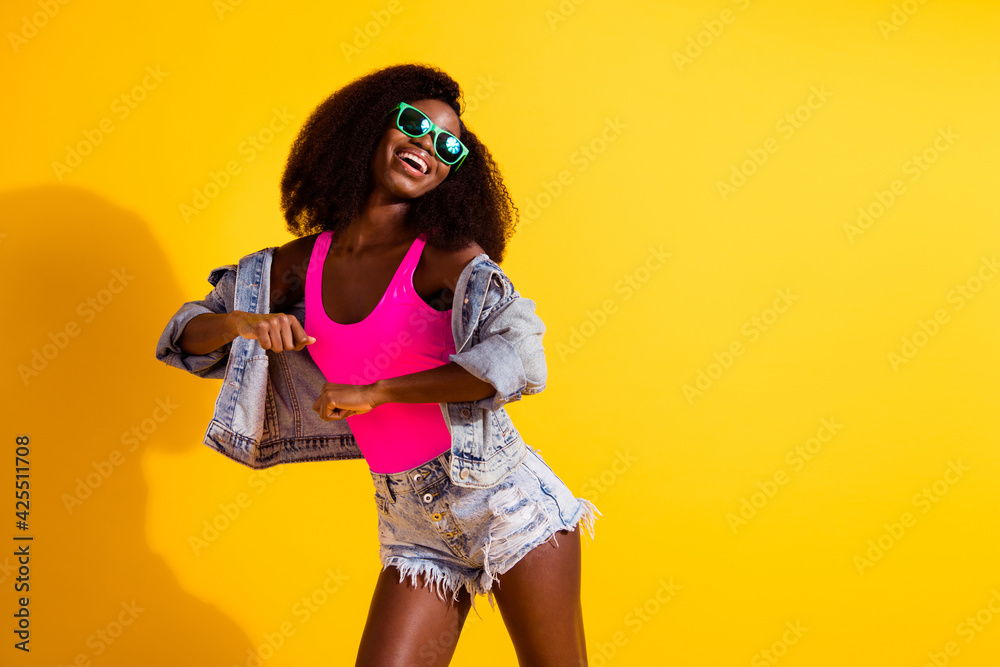 Photo of charming afro american woman dance copyspace summer isolated on shine yellow color background Photo of charming afro american woman dance copyspace summer isolated on shine yellow color background