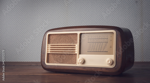 Vintage radio and retro wallpaper